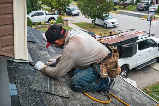Professional Roofing technician working in Winterport, ME